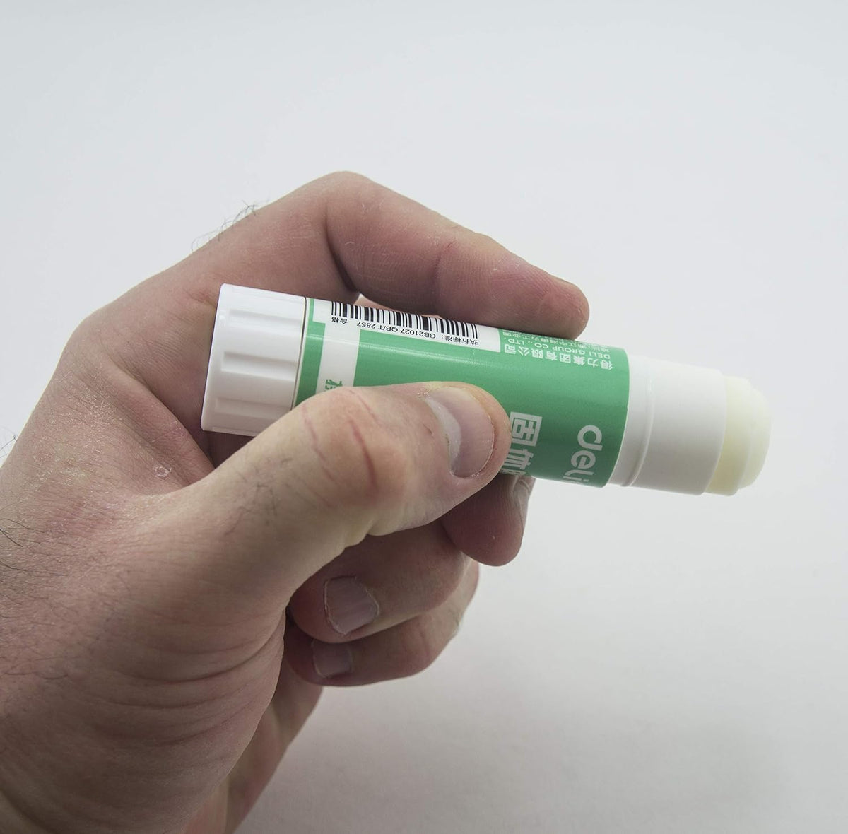 Close-up of a PVA glue stick showing its clean finish and strong adhesive.