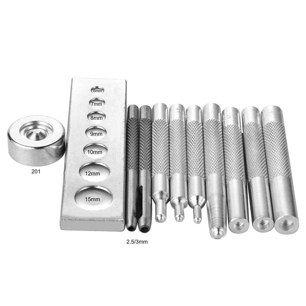 Close-up of steel die punches in various sizes for leathercraft.