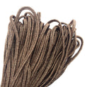 Close-up of metallic bronze plait cord trim on a white background.