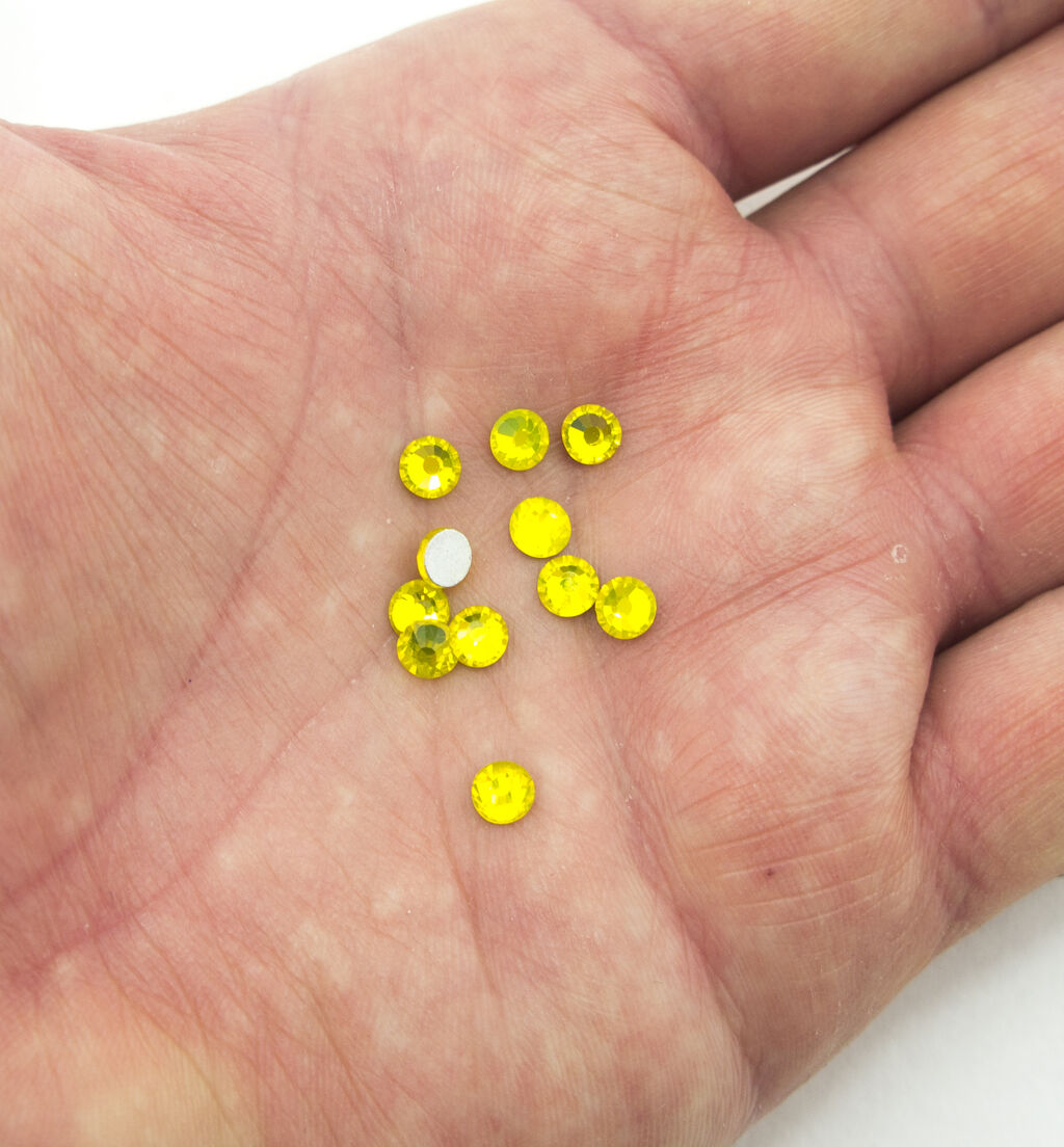 Close-up of 5 mm premium glass rhinestones for embellishment.