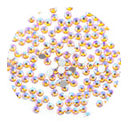 Pack of AB amber glass diamante rhinestones for embellishing garments.
