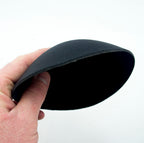 Close-up of soft and comfortable black bra pads for easy replacement.