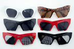 Side view of cat eye sunglasses highlighting arm length.