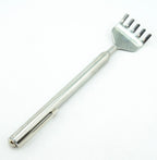 Close-up of the five prongs on the steel backscratcher.