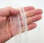 Close-up of ridged nylon plastic boning for corsetry use.
