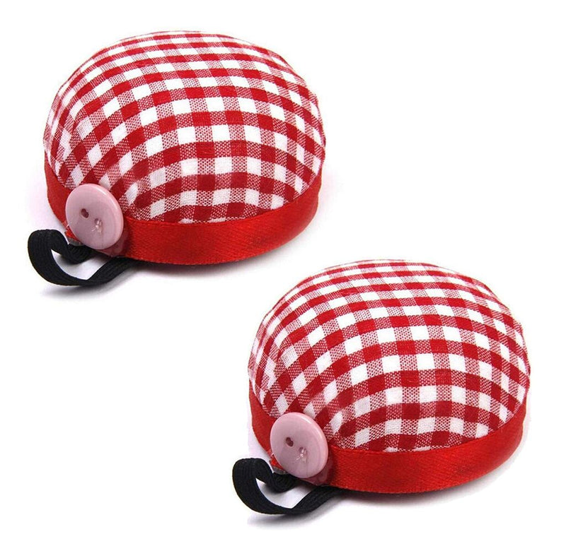 Red check wrist pin cushion worn on wrist for easy access to pins.