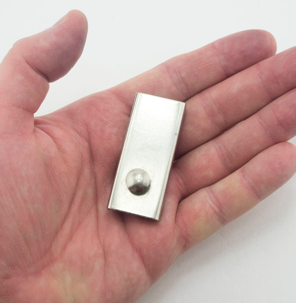 Close-up of the magnetic seam guide showing its dimensions