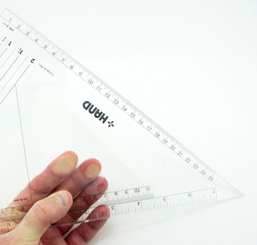 Close-up of the combination graders set square showing measurement markings.