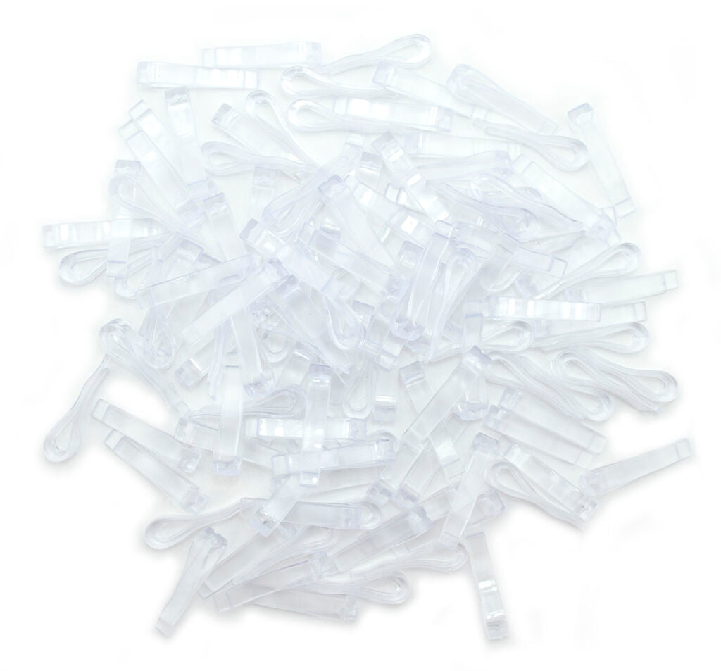 Pack of 1000 clear plastic shirt clips in a transparent container.