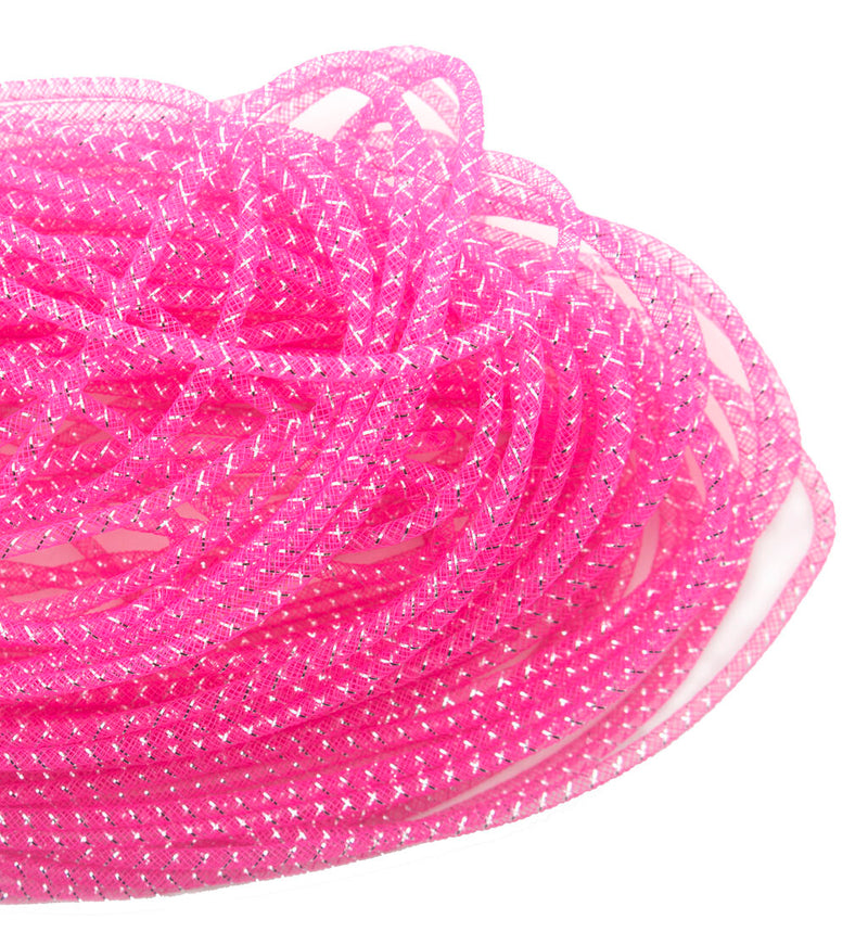 Pink and silver elastic millinery tubular crin trim on a roll.