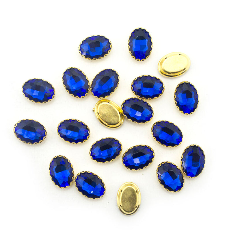 Gold tone royal blue crystal glass oval embellishments in a pack of 20