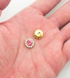 Close-up of 11.8 mm round glass crystal sew on embellishments