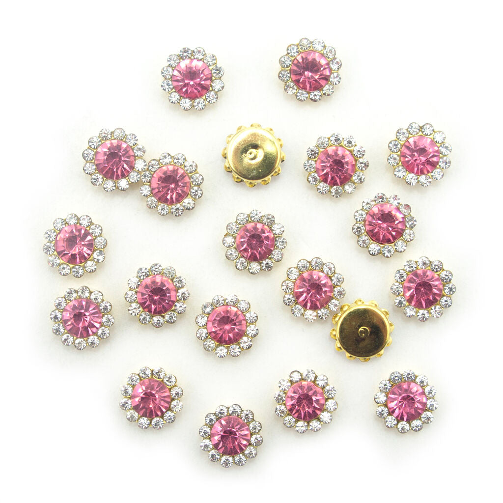Pack of gold tone round pink and white glass crystal embellishments