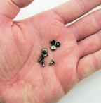 Close-up of 5 mm diameter press studs suitable for jeans and jackets.