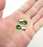 Emerald Green Crystal Glass Teardrop Sew On Embellishments with Silver-Grey Tone Backing - 10 x 14mm - Pack of 50