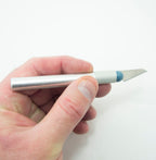 Close-up of the craft knife blades showcasing different shapes.