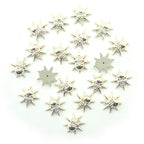 Set of 20 light gold tone star skull embellishments