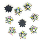 Five-pointed multicoloured crystal glass star embellishments.