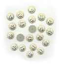 Pack of 20 gold tone sun face embellishments, 16 mm diameter.
