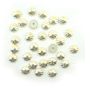 Clover gold tone trims displayed on a white background