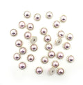 Pack of 30 round rose and gold tone trims, 11mm diameter.