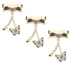 Gold tone scroll and butterfly pendant chain displayed on a white background.