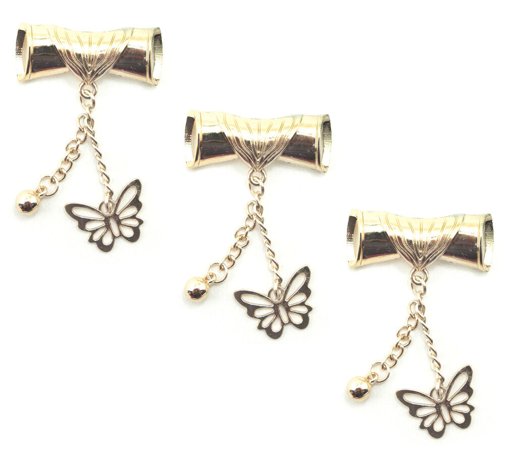 Gold tone scroll and butterfly pendant chain displayed on a white background.