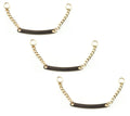 Set of 3 gold tone metal sew on coat hangers displayed.