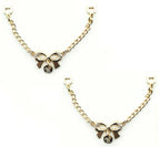 Gold tone ribbon bow chain pendant for hanging garments.