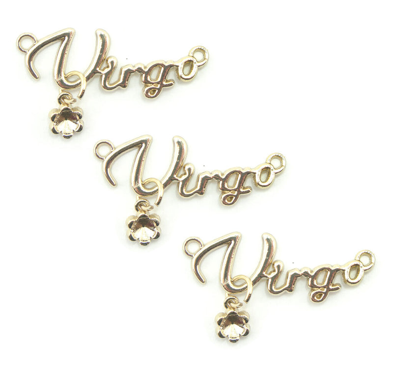 Set of three gold tone metal Virgo pendants displayed together.