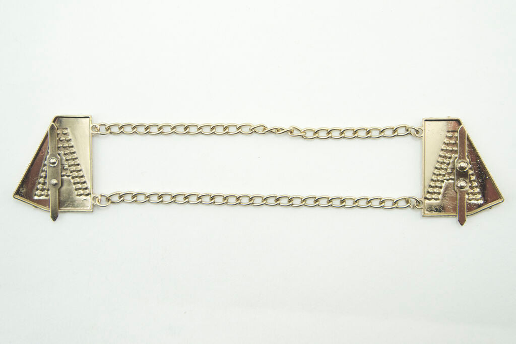 Set of 2 gold tone Letter 'A' embellishments displayed