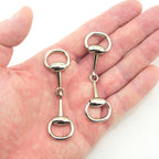 Close-up of 80 mm silver tone buckle for belts and bags
