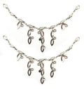 Silver tone metal leaf link chain with lobster clasps.