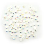 Pack of 100 pearlescent round trims in various colours.