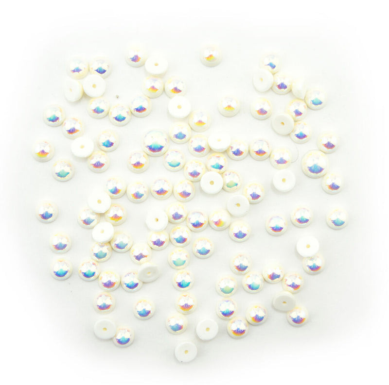 Pack of 100 pearlescent round trims in various colours.