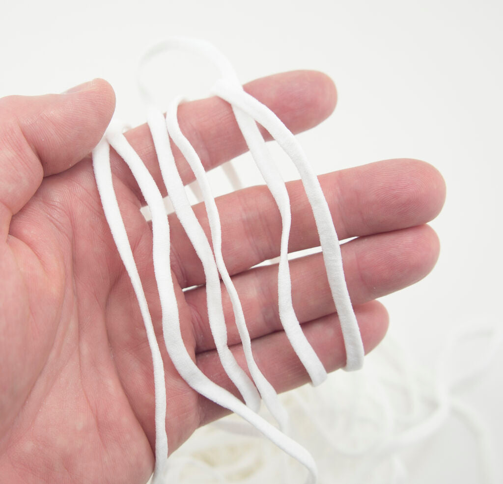 Close-up of 5 mm wide white elastic for crafts