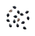 Set of 15 black teardrop glass crystal sew in trims on display.