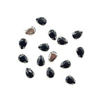 Set of 15 black teardrop glass crystal sew in trims on display.