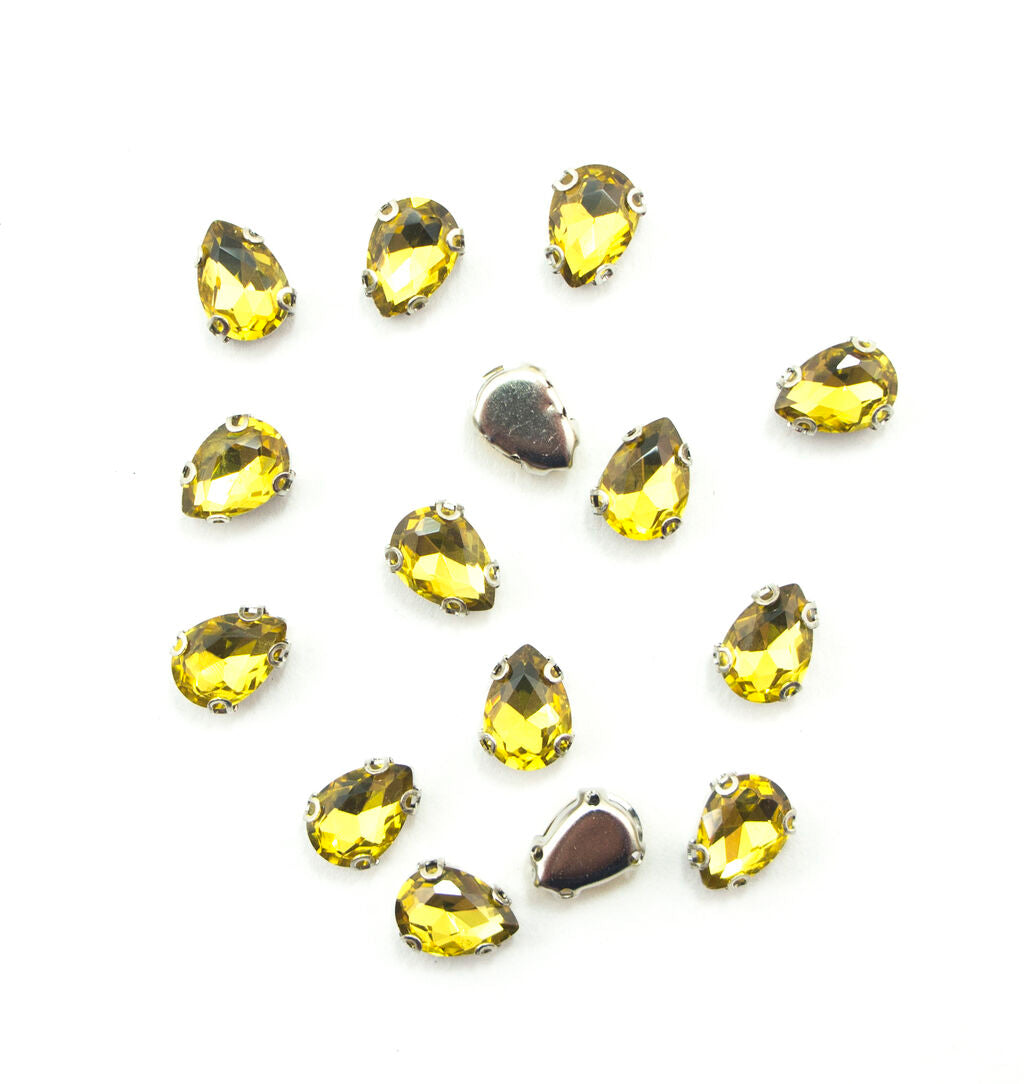 Set of 15 golden yellow teardrop glass crystal sew in trims.
