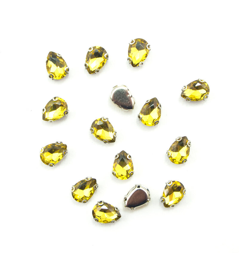 Set of 15 golden yellow teardrop glass crystal sew in trims.