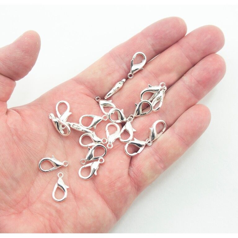Variety of lobster claw clasps in different colours on display