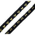 Continuous gold-tone metal hooks and eyes on black cotton tape