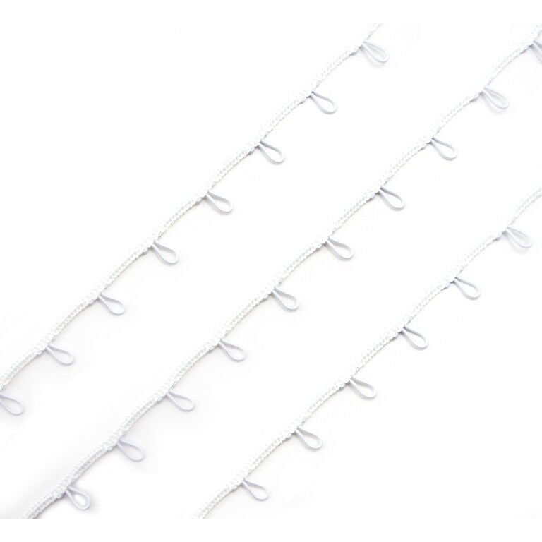 Close-up of white button looping showing texture and colour.
