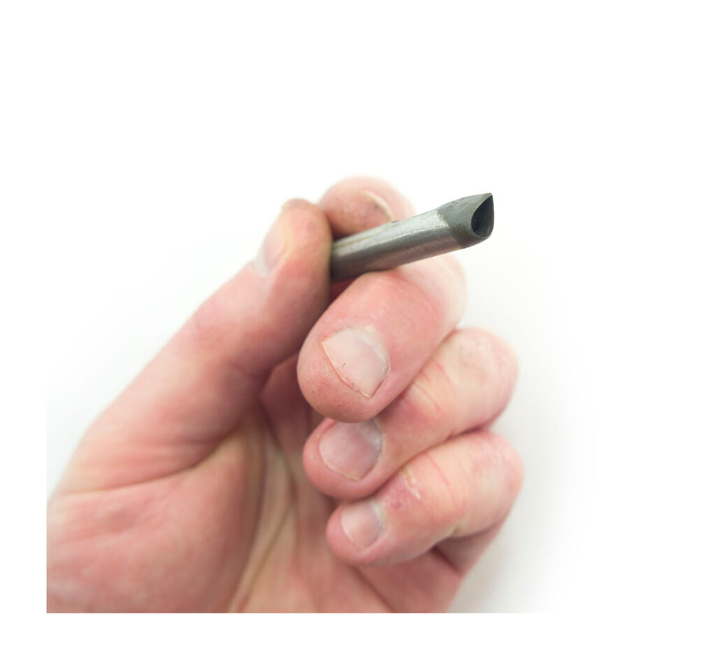 Steel leather punch tool showing teardrop design and size.