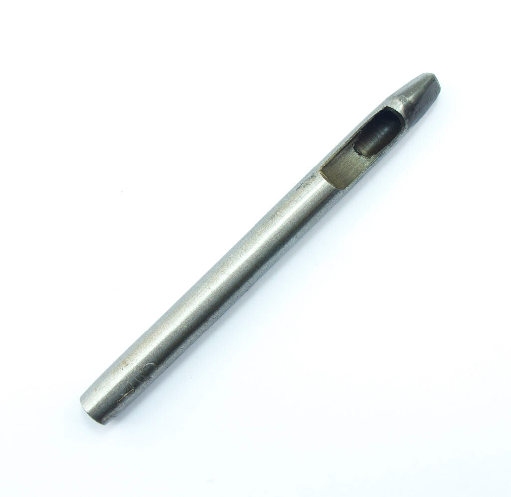 Leather punch tool in use on a piece of leather material.