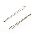 Two steel elastic ribbon threaders on a white background.