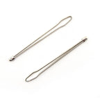 Two steel elastic ribbon threaders on a white background.