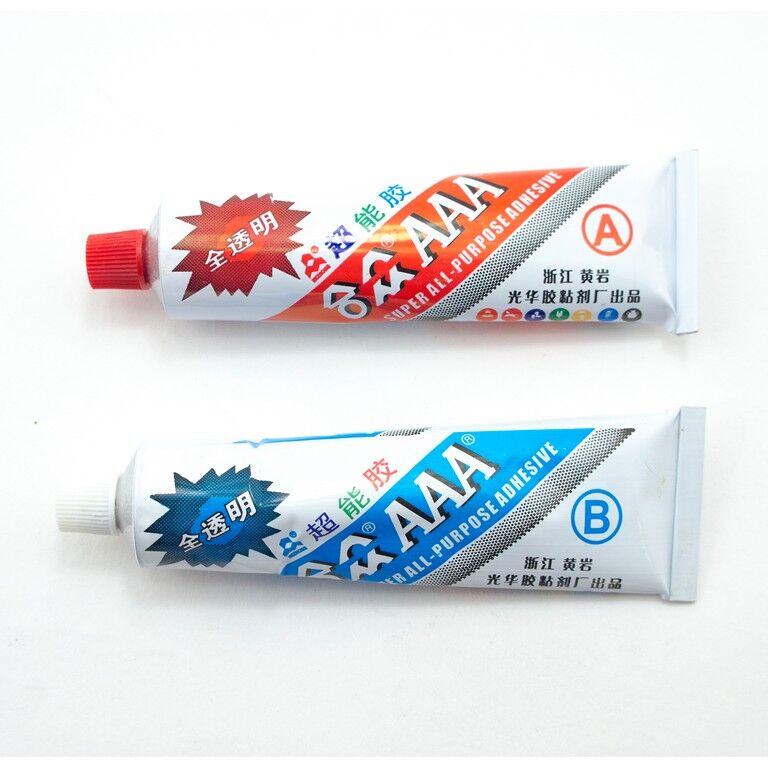 Application of epoxy adhesive on a wooden surface.