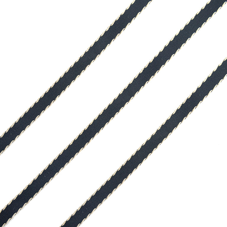 Black and gold ribbon trim displayed on a white background.