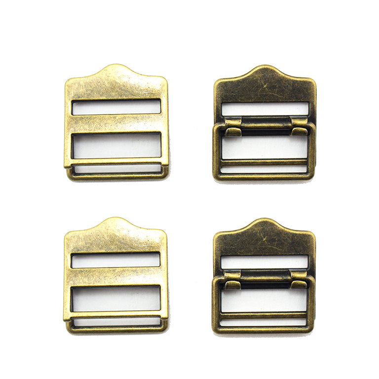 Set of 4 antique gold tone metal buckles for fastening garments